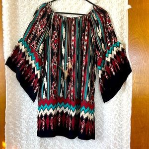 Can be worn as blouse or dress.